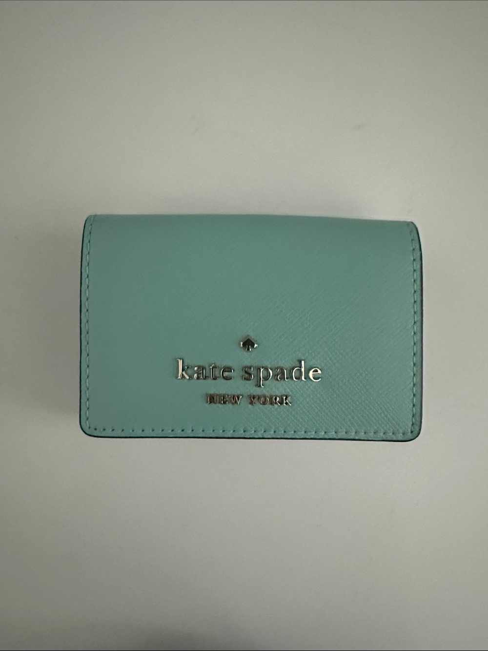 kate spade light teal leather compact wallet